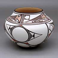 A polychrome jar decorated with a four-panel bird element and geometric design
 by Gabriel Paloma of Zuni