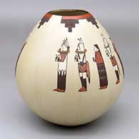 A polychrome jar decorated with a Day Chant Dancer and geometric design
 by Ida Sahmie of Dineh