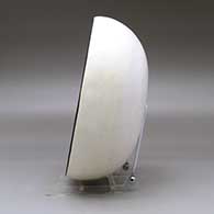 A black on white bowl decorated inside with a Mimbres replica of the Fisherman design, click or tap to see a larger version