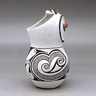 A polychrome owl figure decorated with a fineline, spiral and geometric design, click or tap to see a larger version
