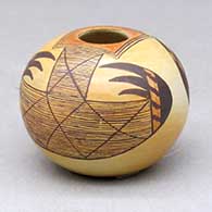 Click for a larger view A miniature polychrome seed pot decorated with a two-panel stylized migration pattern design
by Les Namingha of Hopi