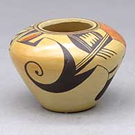 A small high-shouldered polychrome jar decorated with a bird element and geometric design
 by Les Namingha of Hopi