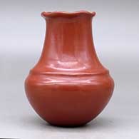 A double-shouldered plain, polished red water jar with a pie crust rim, click or tap to see a larger version
