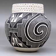 A black on white jar decorated with a three-panel Tularosa spiral, fineline, kiva step and geometric design, plus a band of corrugation around the neck, click or tap to see a larger version