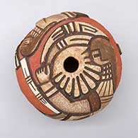 Polychrome seed pot with a lightly carved and painted dancer and geometric design over a textured background
 by Gary Polacca Nampeyo of Hopi