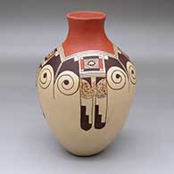 A polychrome jar decorated with a four-panel eagletail and geometric design
 by Clinton Polacca of Hopi