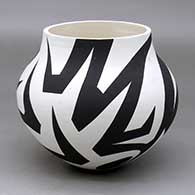 A black on white jar decorated with a geometric design
 by Eric Lewis of Acoma