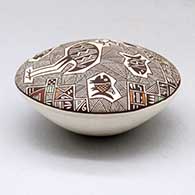 A polychrome seed pot decorated above the shoulder with a crane, fish, fineline and geometric design, click or tap to see a larger version