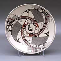 Click for a larger view A shallow polychrome bowl decorated with a quail, serpent, fish, fineline and geometric design
by Hector Gallegos Sr of Mata Ortiz and Casas Grandes