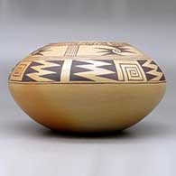 A black on brown jar decorated with a geometric design above the shoulder and fire clouds, click or tap to see a larger version