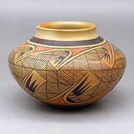 A polychrome jar decorated with a migration pattern design
 by Fannie Nampeyo of Hopi