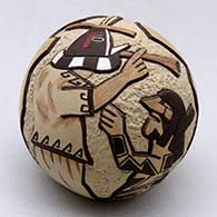 A miniature polychrome seed pot decorated with a lightly carved, sgraffito and painted masked flute player, dancer and geometric design
 by Lawrence Namoki of Hopi