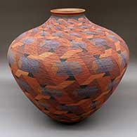 A large polychrome tiny-coil jar with a sgraffito and painted geometric design around almost the entire surface
 by Richard Zane Smith of Wyandot