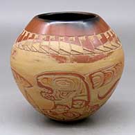 A polychrome jar decorated with a lightly carved and slipped Northwest Coast and geometric design
 by Jody Folwell of Santa Clara