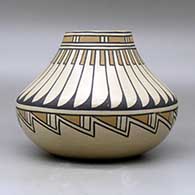 A polychrome low shouldered jar  decorated with a feather and geometric design, click or tap to see a larger version