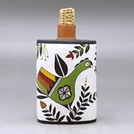 A polychrome flask with a corn cob stopper and decorated with a parrot, plant and geometric design, click or tap to see a larger version