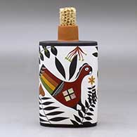 A polychrome flask with a corn cob stopper and decorated with a parrot, plant and geometric design, click or tap to see a larger version