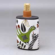 A polychrome flask with a corn cob stopper and decorated with a parrot, plant and geometric design
 by Charmae Natseway of Acoma