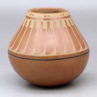 A polychrome jar decorated with a band of feathers design above the shoulder
 by Blue Corn of San Ildefonso