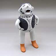 A standing male opera singer figure
 by Martha Arquero of Cochiti