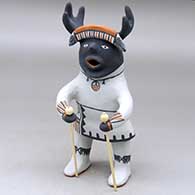 A deer dancer in full dance regalia
 by Martha Arquero of Cochiti