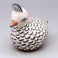 A sitting polychrome hen  figure
 by Seferina Ortiz of Cochiti