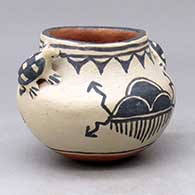 Click for a larger view A small polychrome bowl with turtle applique handles and a rain cloud and geometric design
by Unknown of Cochiti