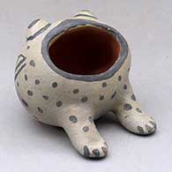 A polychrome open mouthed frog figure
 by Unknown of Cochiti