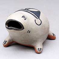 A polychrome animal figure with a geometric design on its back
 by Frances Herrera of Cochiti