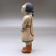 A standing polychrome singing woman figure, click or tap to see a larger version