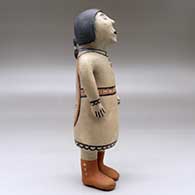 A standing polychrome singing woman figure, click or tap to see a larger version