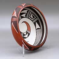 A polychrome bowl decorated inside with a bird-hanging-from-sky-band and geometric design and around the shoulder with a geometric design, click or tap to see a larger version