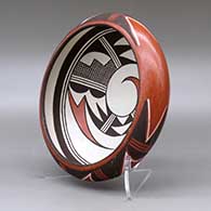 A polychrome bowl decorated inside with a bird-hanging-from-sky-band and geometric design and around the shoulder with a geometric design, click or tap to see a larger version