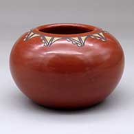 A polychrome bowl decorated with a band of geometric design around the opening
 by Lois Gutierrez of Santa Clara