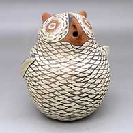 A polychrome owl figure with a chick sitting on its tail
 by Nellie Bica of Zuni
