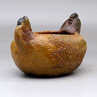 A brown chicken effigy bowl with fire clouds, click or tap to see a larger version
