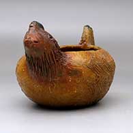 A brown chicken effigy bowl with fire clouds, click or tap to see a larger version