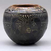 A miniature black jar with a sienna rim and decorated with a sgraffito avanyu, feather, bighorn ram, mountains and geometric design
 by Kevin Naranjo of Santa Clara