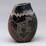 A brown seed pot with an organic opening, ovoid shape and a sgraffito horse and geometric design
 by Jody Folwell of Santa Clara