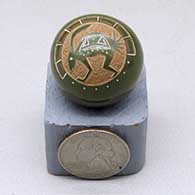 Click for a larger view A miniature polychrome seed pot decorated with a sgraffito and painted Mimbres rabbit and geometric design
by Haungooah aka Art Cody of Santa Clara