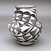 Click for a larger view A black on white jar decorated with a two panel fineline, rainbow and geometric design
by Marie Z Chino of Acoma