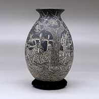 A black on white jar decorated with a sgraffito Night of the Dead at the Cemetery design, click or tap to see a larger version