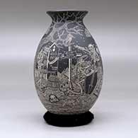 A black on white jar decorated with a sgraffito Night of the Dead at the Cemetery design, click or tap to see a larger version