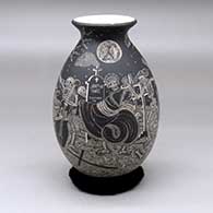 Click for a larger view A black on white jar decorated with a sgraffito Night of the Dead at the Cemetery design
 by Hector Javier Martinez of Mata Ortiz and Casas Grandes