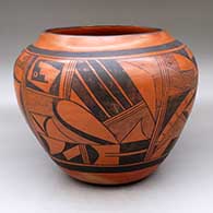 Click for a larger view A large black on red jar decorated with a four-panel geometric design
by Paqua Naha aka 1st Frogwoman of Hopi