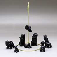 A nine-piece nativity set with a hanging angel, click or tap to see a larger version