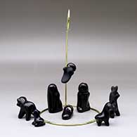 A nine-piece nativity set with a hanging angel, click or tap to see a larger version