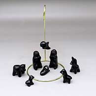 A nine-piece nativity set with a hanging angel
 by Dorothy Gutierrez of Santa Clara