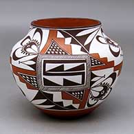 A polychrome jar decorated with a three-panel geometric design
 by Franklin Peters of Acoma