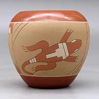 A polychrome jar decorated with a sgraffito and painted avanyu, lizard and geometric design, click or tap to see a larger version